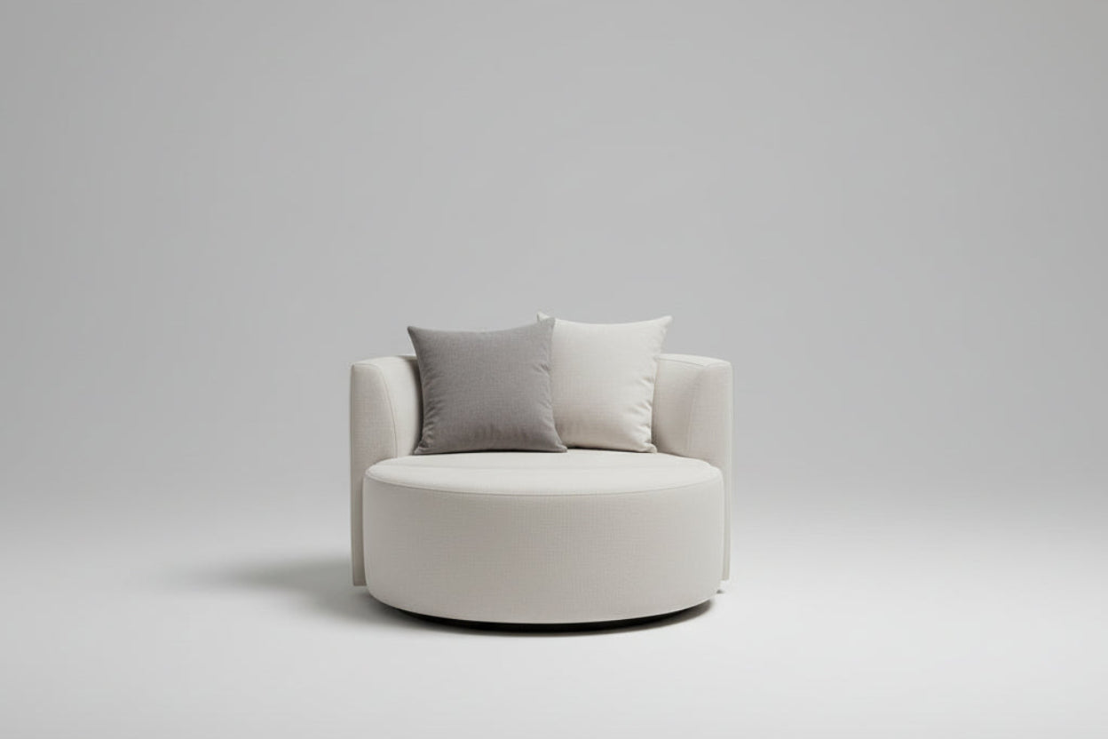 Round white chair with gray cushions on a light gray background