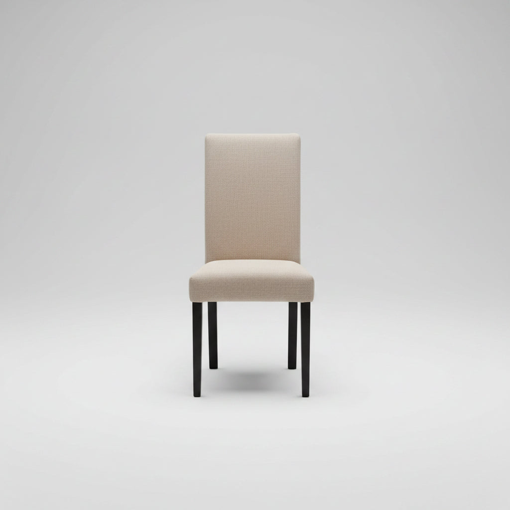 Two beige stools with black legs on a concrete floor.
